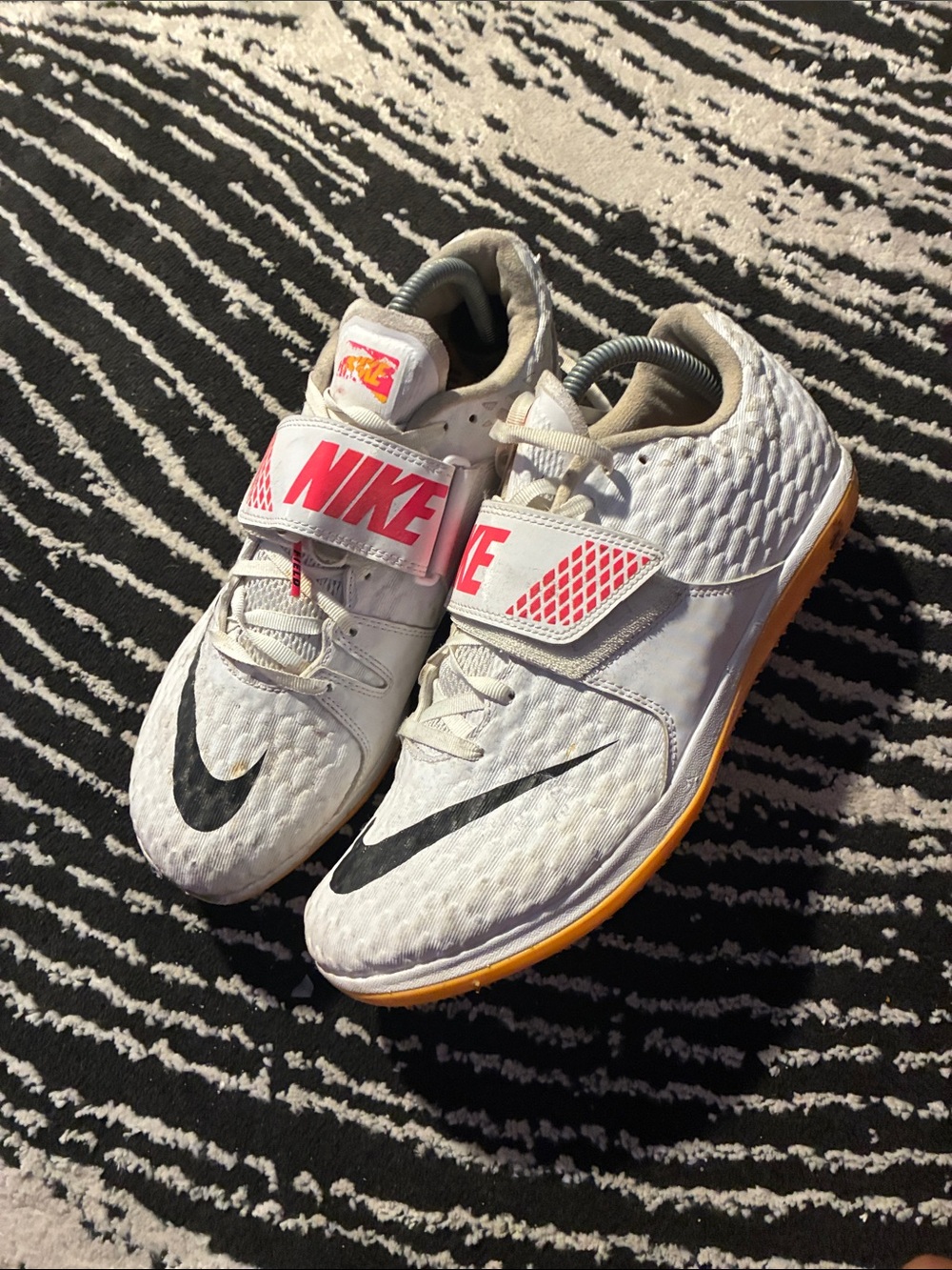 Nike track and field White Sneakers with Pink Accents and Black Swoosh